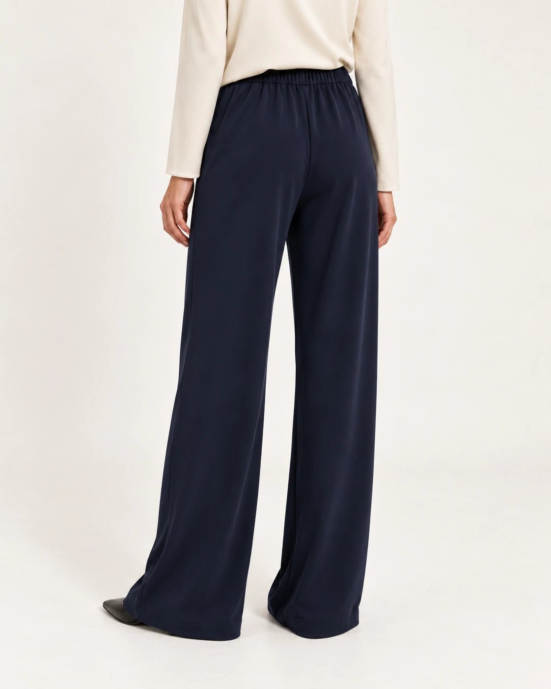 Pantalone palazzo blu, vista posteriore - MADAME VENICE - FW25 - PEONIA - JERSEY TECNICO #Colore_Blue